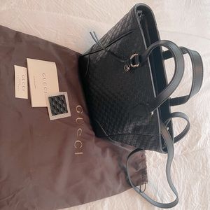 Authentic Gucci Guccissima Bree Black crossbody.